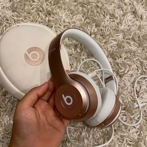 Beats rose gold headphones
